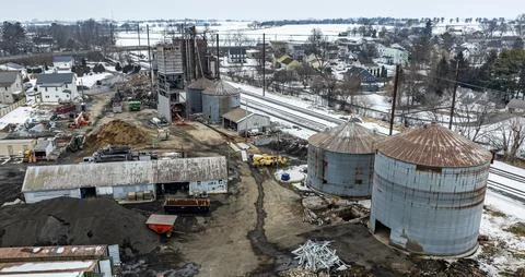 Construction Site Near a Train Track With Silos and Buildings in a Rural Ar.. Stock Photos