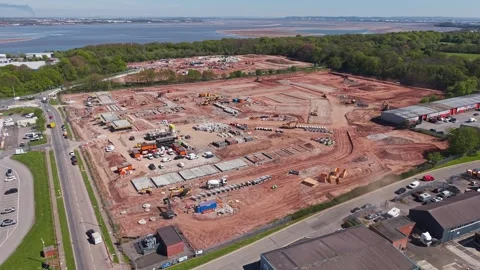Construction site of new build housing on brownfield site Stock Footage 334799774