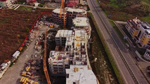 Construction site of a new building complex near a busy road Stock Footage 324523238