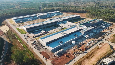 Construction site of new large factory complex under development. Assembly of Stock Footage 238565689