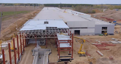 At the construction site a new, modern plant is being built, several workshops  Stock Footage 161962201