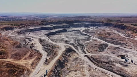 Construction site in an open pit mine near a rural area Stock Footage 344539752