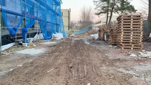 A Construction Site Pathway made up of Pallets and Protective Mesh for safe.. Stock Photos