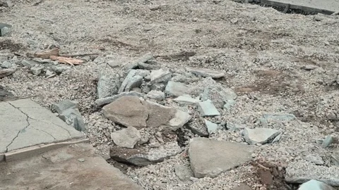 Construction site with piles of rubble and debris on the ground. Various Stock Footage 339095821