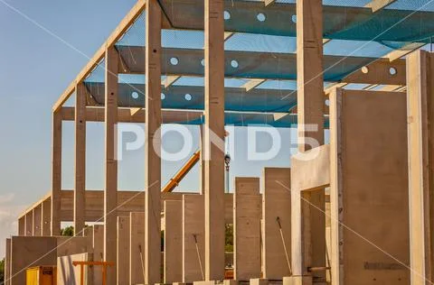 Construction site with precast concrete columns, beams and walls Stock ...