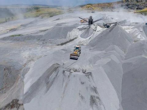 Construction site processes large amounts of gravel and sand in the day Stock Photos