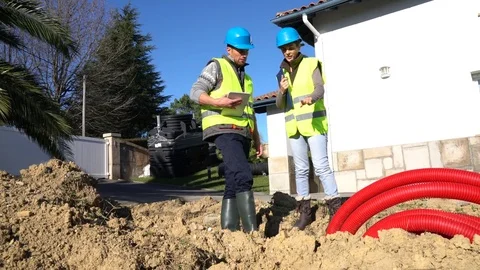Construction site professional looking at digging in work Stock Footage 72010150