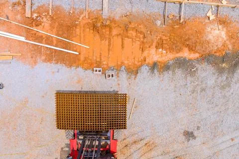 Construction site in progress with heavy machinery metal mesh materials on a 写真素材