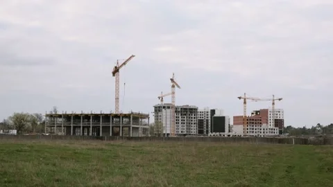 Construction site of residential complex. Residential apartment houses under Stock Footage 152784200