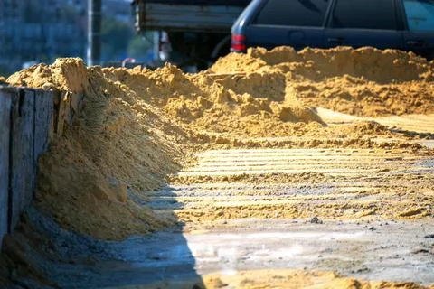 Construction site in a residential development shows signs of sand loading by Stock Photos