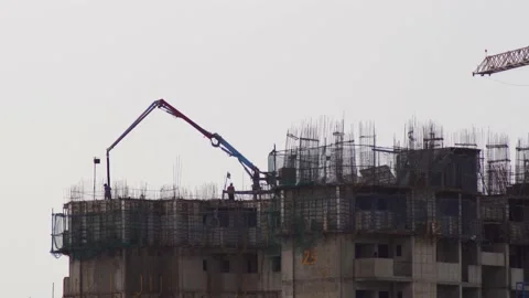 Construction site on the rooftop of a tower skyscraper with rebar bars stiking Video stock 155070141