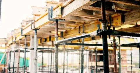 Construction site, scaffolding and infrastructure for urban development wit.. Stock Photos