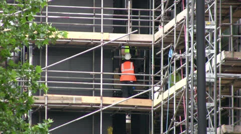 Construction site with scaffolding medium shot Stock Footage 25031316