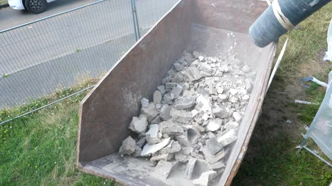 Construction site - scaffolding, rubble chute and debris container Видео 247995769