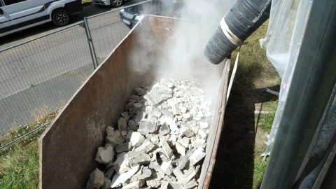 Construction site - scaffolding, rubble chute and debris container Видео 247996068