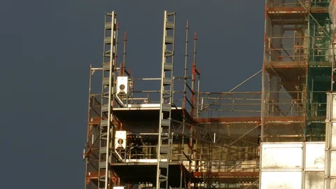 Construction site, scaffolding at a skyscraper, Germany, Europe Stock Footage 121198757