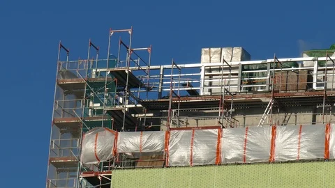 Construction site, scaffolding at a skyscraper, Germany, Europe Stock Footage 122367256