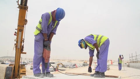 Construction site sequences in Qatar during boom Stock Footage 105909256