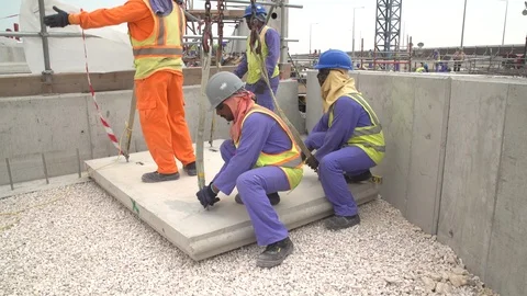Construction site sequences in Qatar during boom Stock Footage 105909408