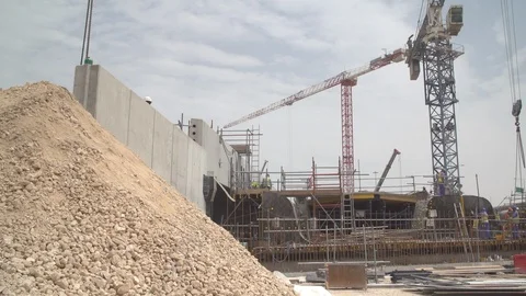 Construction site sequences in Qatar during boom Stock Footage 105912103