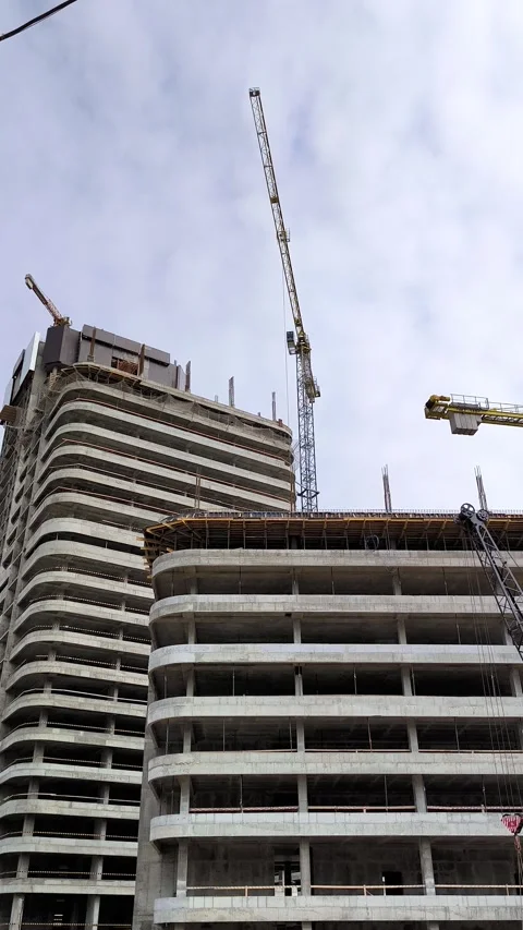 Construction site with several busy cranes Video stock 270305659