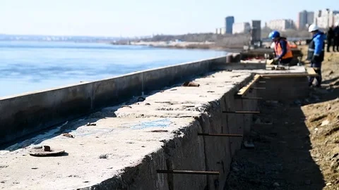 Construction site on the shore of a reservoir. 库存影片 339764779