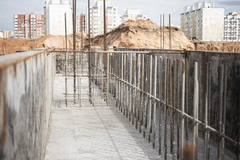 A construction site showcases a massive dirt pile, a vital element for the cr Stock Photos