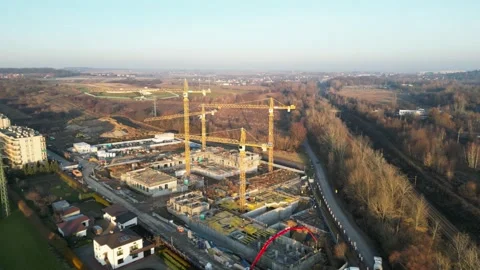 Construction site showcasing cranes and ongoing building activities Stock Footage 323948004