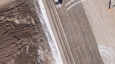 Construction site showcasing heavy machinery and fresh earthworks during Stock Footage 281333857