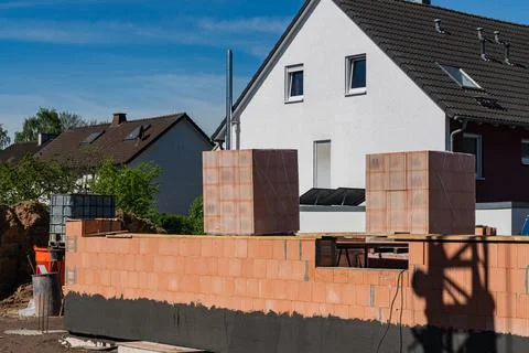 Construction site shows block masonry work in progress 写真素材
