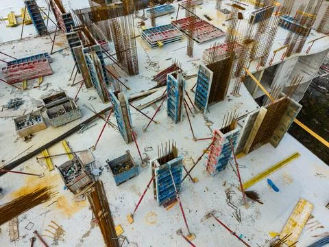 Construction site shows building framework with concrete forms and rebar st.. Fotos de archivo