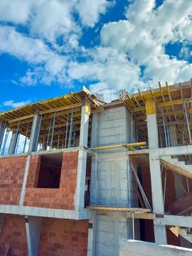 Construction site shows building framework with bricks in the process of be.. Fotos de archivo