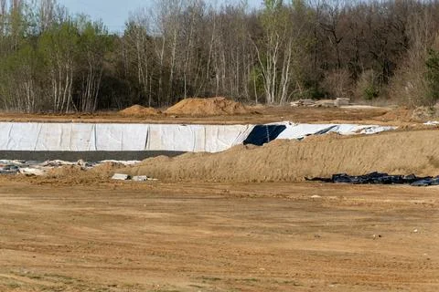Construction Site Shows Earth Moving and Material Laying in a Natural Area .. Stock Photos
