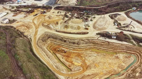 Construction site shows heavy machinery working on land development in a rural Stock Footage 331901188
