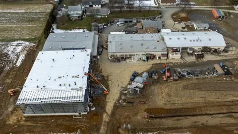 Construction Site Shows Progress on New Buildings With Machinery in Operation Stock Photos