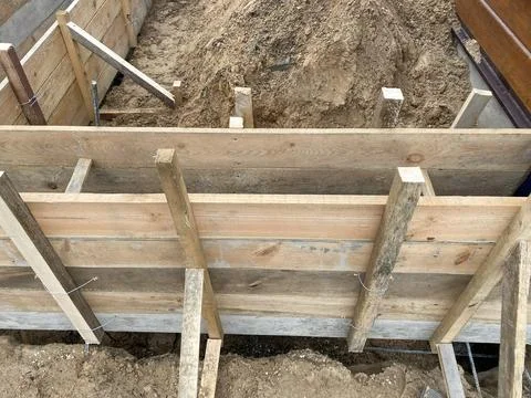 Construction site shows wooden forms for a concrete foundation  Fotos de archivo