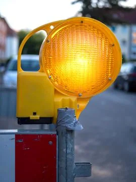 Construction site shut-off with a construction site warning light Stock Photos