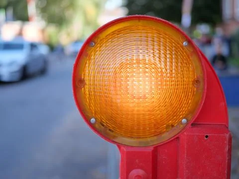 Construction site shut-off with a construction site warning light Stock Photos