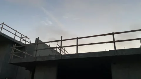 Construction Site Silhouette at Sunset Stock Footage 156641224