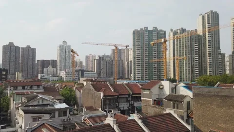 Construction site with skyscrapers due to globalization causing pollution, China Stock Footage 159736759