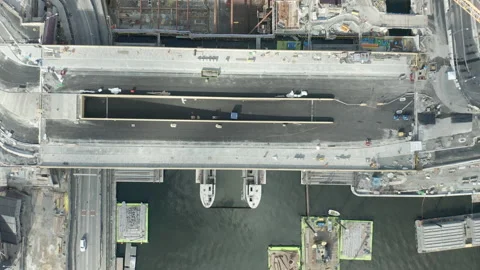 The construction site Slussen &amp; Golden bridge in Stockholm city, aerial top down Stock Footage 142136281