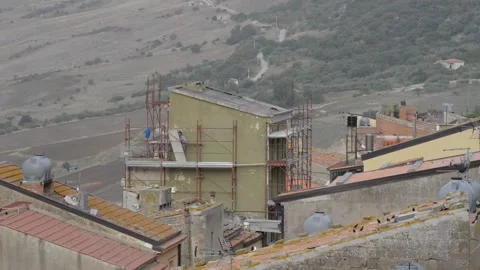 Construction site in a small town near the hills Stock-Footage 143582886