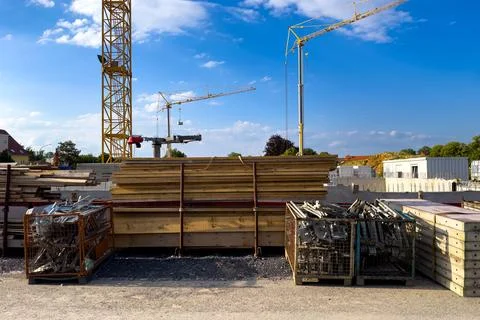 Construction site with stacked timber on it Stock Photos