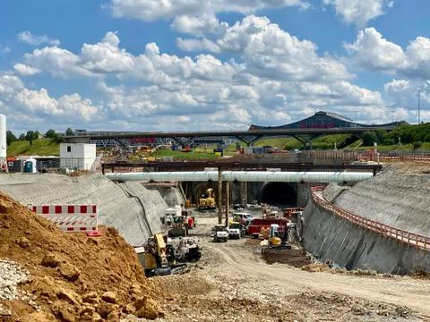 Construction site of the Stuttgart21 railway project with huge machinery at the Stock Photos