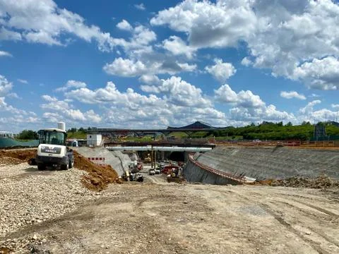 Construction site of the Stuttgart21 railway project with huge machinery at the Stock Photos