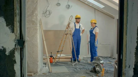 Construction site team or architect and builder or worker with helmets Video stock 91236287