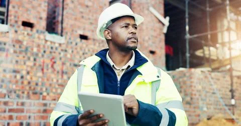 Construction site, thinking and black man with engineering, tablet for onli.. Stock Photos