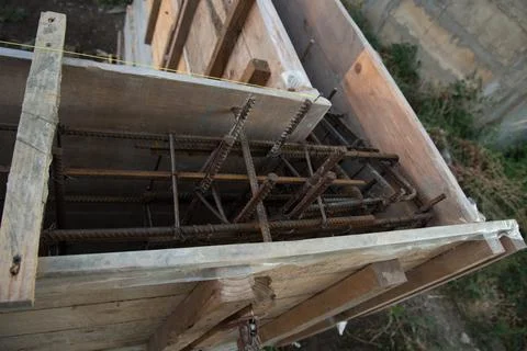 Construction site. The timber formwork is prepared for pouring concrete. The Stock Photos