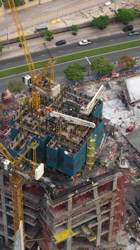Construction site timelapse with a Potain tower crane in Dubai Stock Footage 340443985