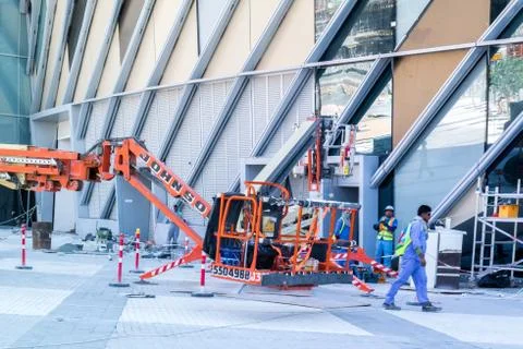 Construction site, tools, crane and building under construction Stock Photos